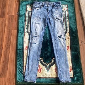 American eagle blue light rips jeans.
